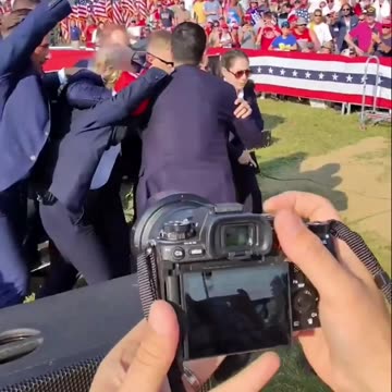 POV of Trump Shooting Photographer