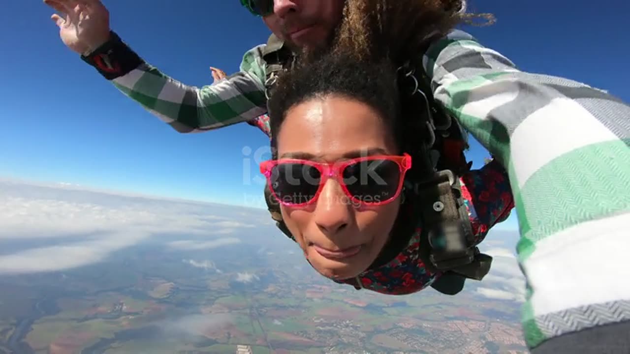 Beautiful Brazilian afro woman practicing skydiving