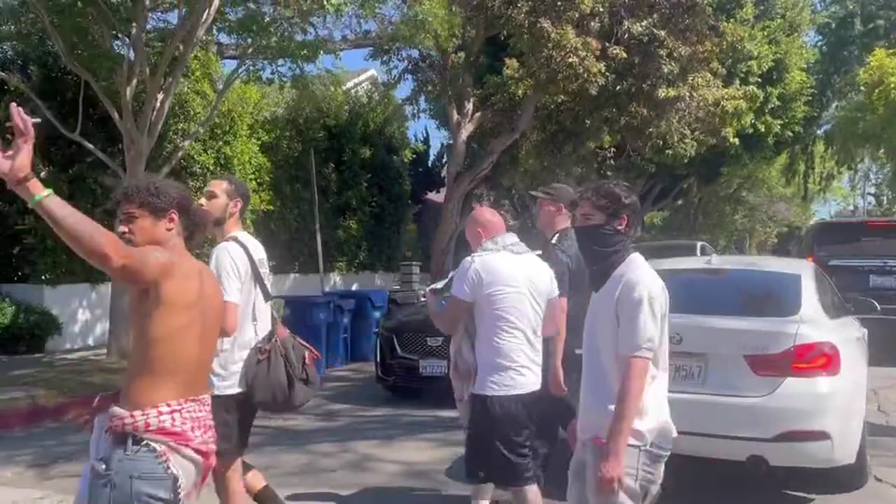 Angry mob looking for Jews. Germany 1938?