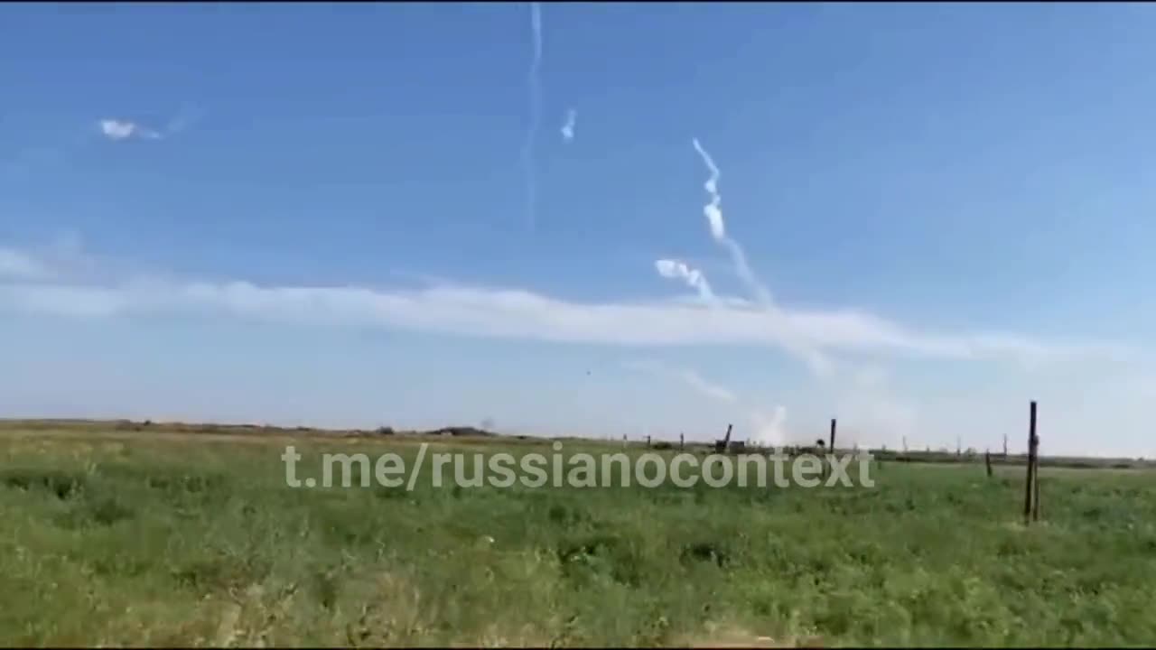 A Russian cameraman is filming the work of air defense. And here comes a flight nearby...