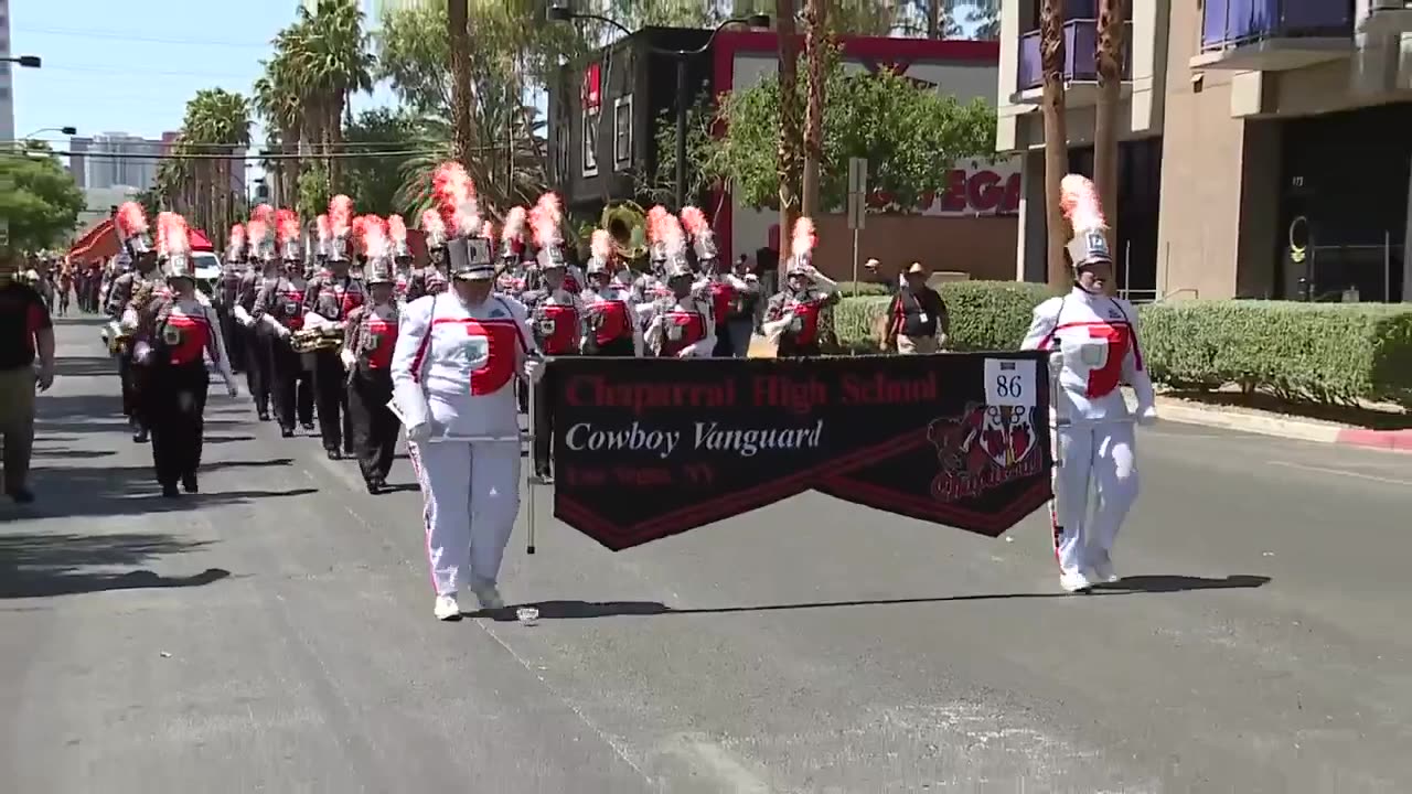 Kelsey McFarland talks to parade spectators