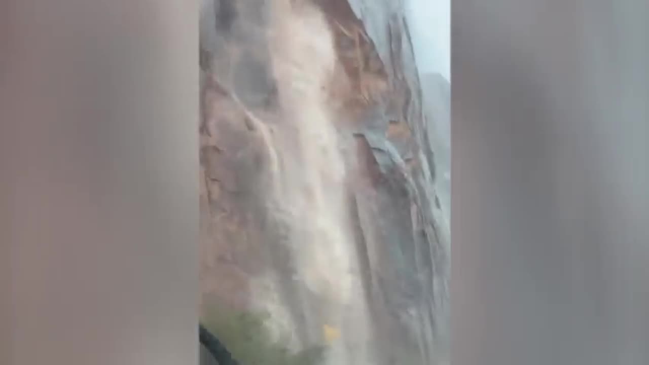 Man Rappels Downs Cliff After 'Once-in-150-Years' Storm