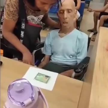 WOMAN BRINGS DEAD MAN INTO BANK TO SIGN A LOAN