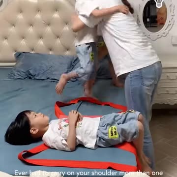 She can carry three children on her shoulder at once!