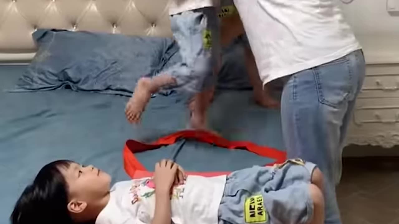 She can carry three children on her shoulder at once!