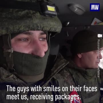 Specialists of the courier-postal service deliver letters and parcels to Russian servicemen