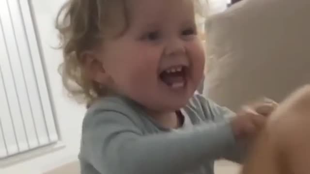 Baby Hilarious reaction while playing with dad