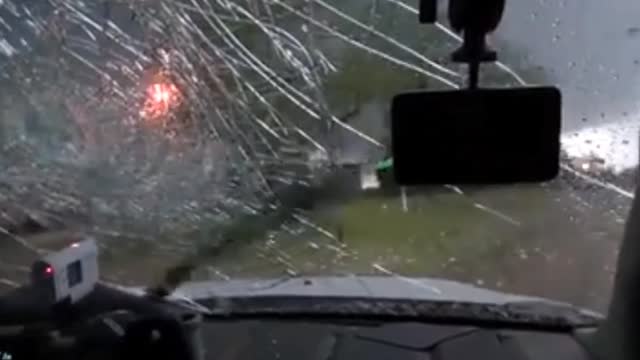 Extremely Large Hail Breaks Windshield in Texas