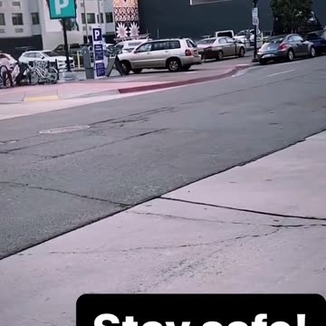 Meanwhile, in West Hollywood: Homeless guys blocking traffic a man in the car