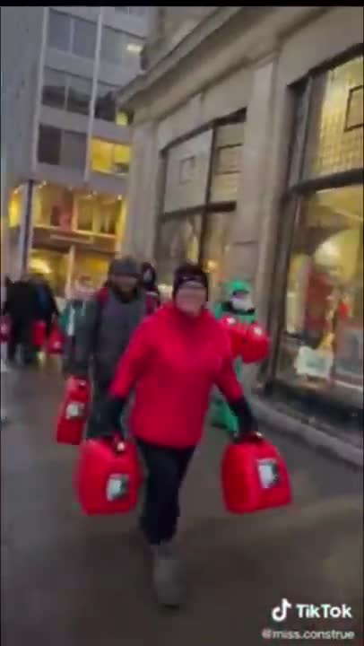 Ottawa residents carry empty gas cans