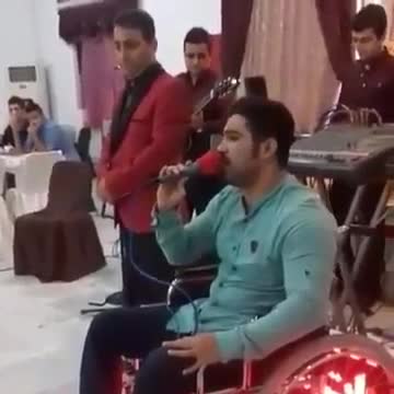 Mojtaba Forghani, the wrestler, singing a song