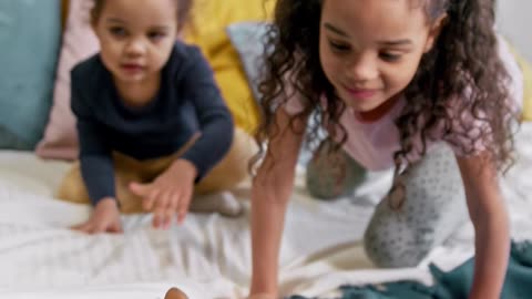 kids playing with cat and enjoying moments