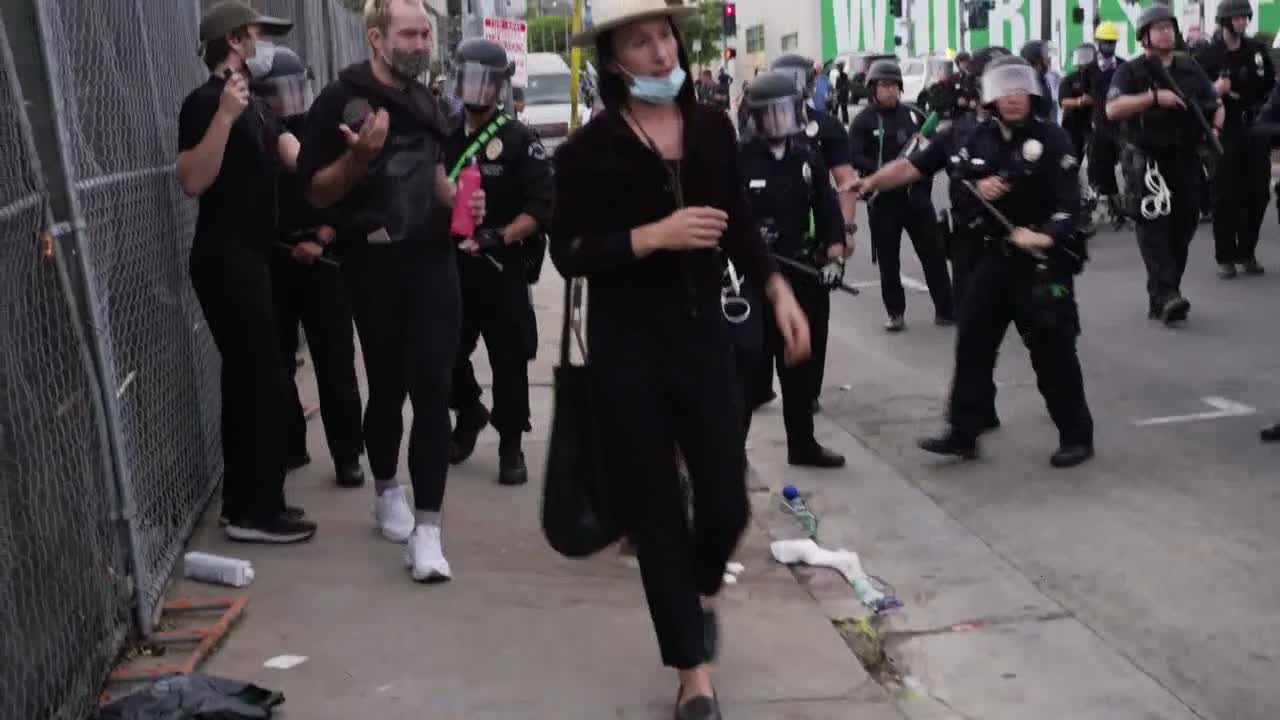 Hollywood Protesters Pushed Against Fence During Protest