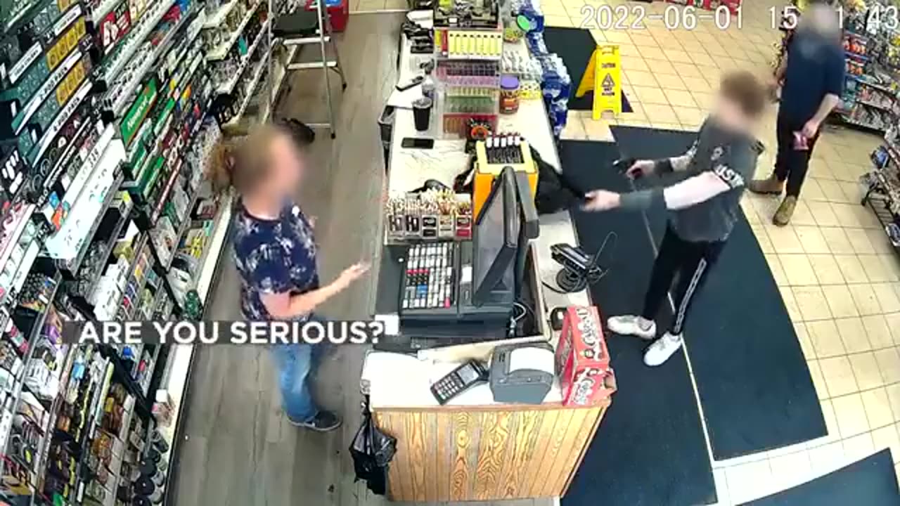 Video of a 12 year old kid in Michigan robbing a gas station at gun point