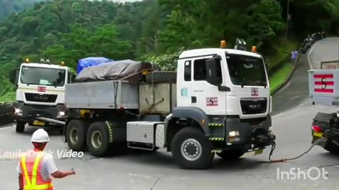 Three MAN Trucks With Heavy Weight Loaded Crossing an extreme roads