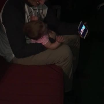 Baby laughing at a video of herself