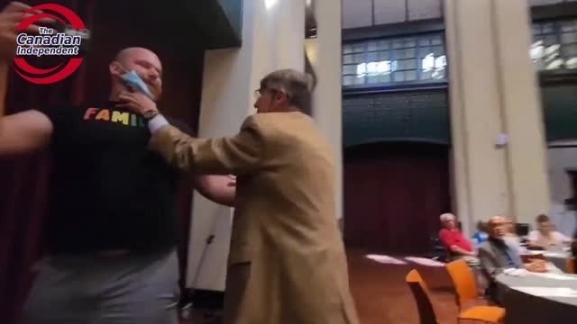 Man gets attacked and choked by a big pharma rep after calling out Pfizer