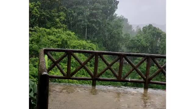 Rain fall beside hill