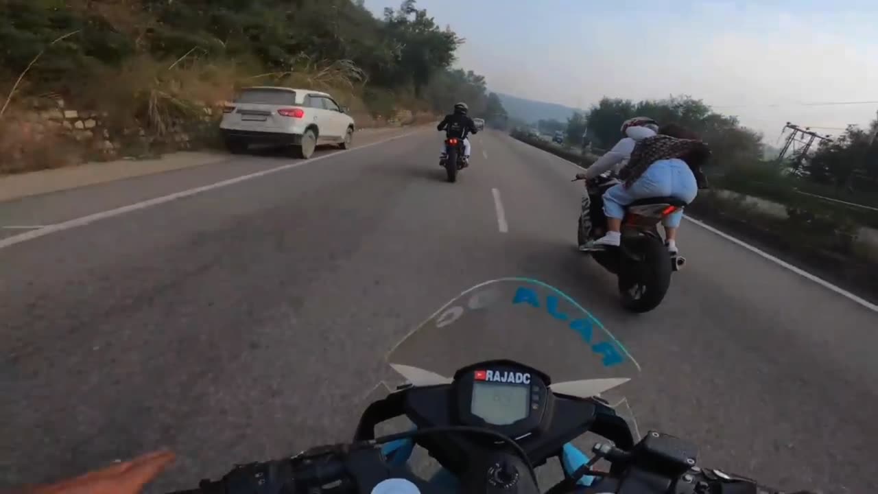 Bike Rider's racing in the highway road