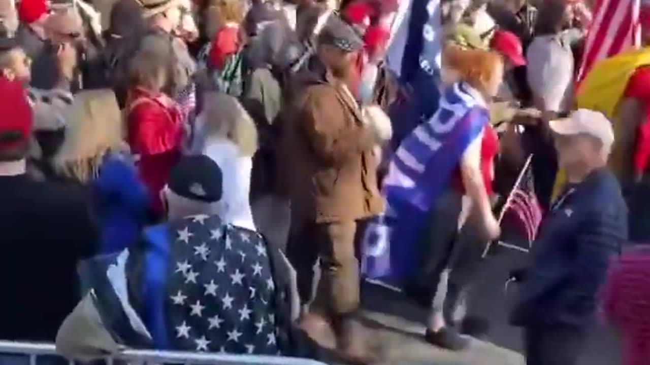 Patriots March As Far As The Eye Can See Towards The Miami Court House