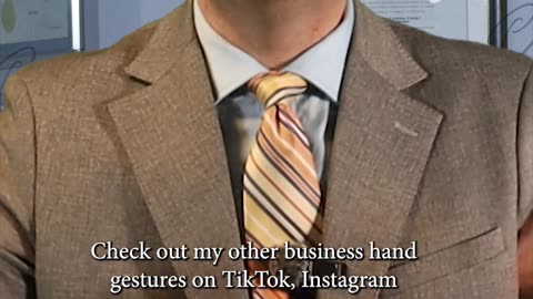 Business hand gestures! This one means"Growth"
