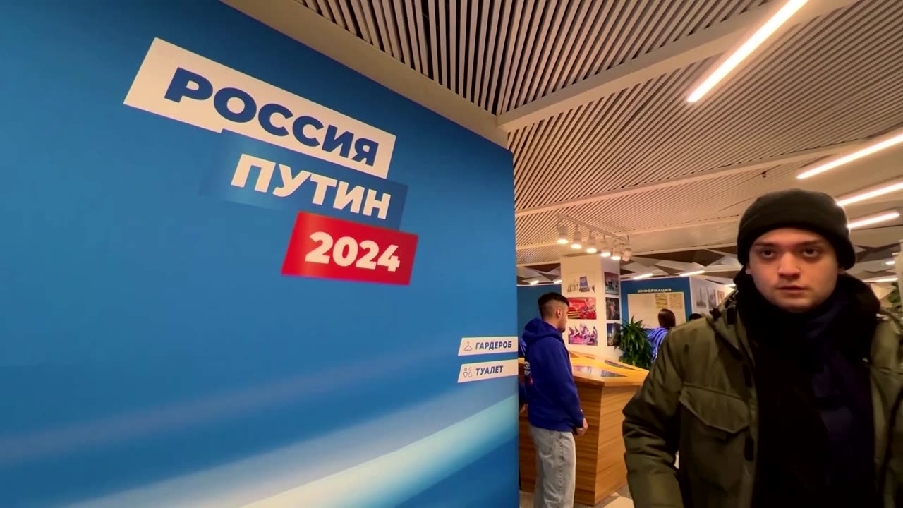 Soldier's wife demands his return at Putin election HQ