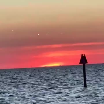 MIDDLE OF THE OCEAN UFOs ANGELS CHARIOTS OF GOD HOVERING ILLUMINATED 🕎Isaiah 66;16 “FIRE HIS SWORD”