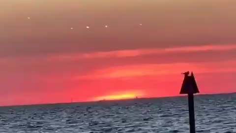 MIDDLE OF THE OCEAN UFOs ANGELS CHARIOTS OF GOD HOVERING ILLUMINATED 🕎Isaiah 66;16 “FIRE HIS SWORD”