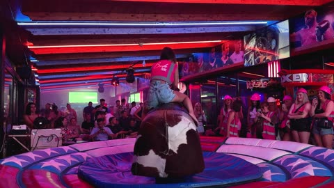 GIRL TAKE ON THE BULL! Benidorm Bull Ride. Mechanical Bull EPIC FAIL