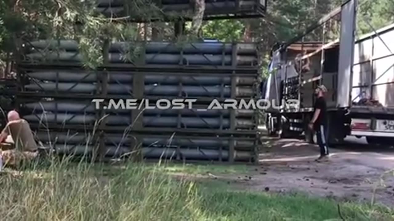 Ukrainian army unloading 9M27K3 rockets with a cluster warhead for Uragan MLRS from a civilian truck