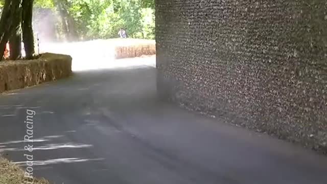 This electric 'batmobile" smashed the record for fastest car on the Goodwood Hill course,