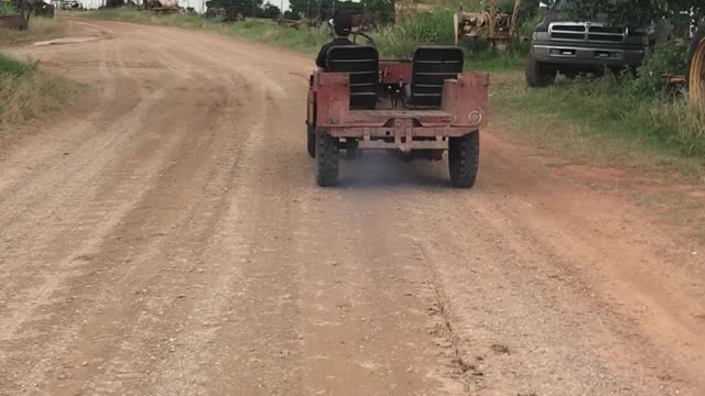 My Son driving Rusty Red