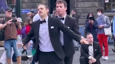 The Human Fountain in Edinburgh, UK... How do they manage not to laugh?