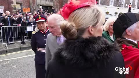 23_Eggs thrown at King Charles during visit to York; protester detained by police