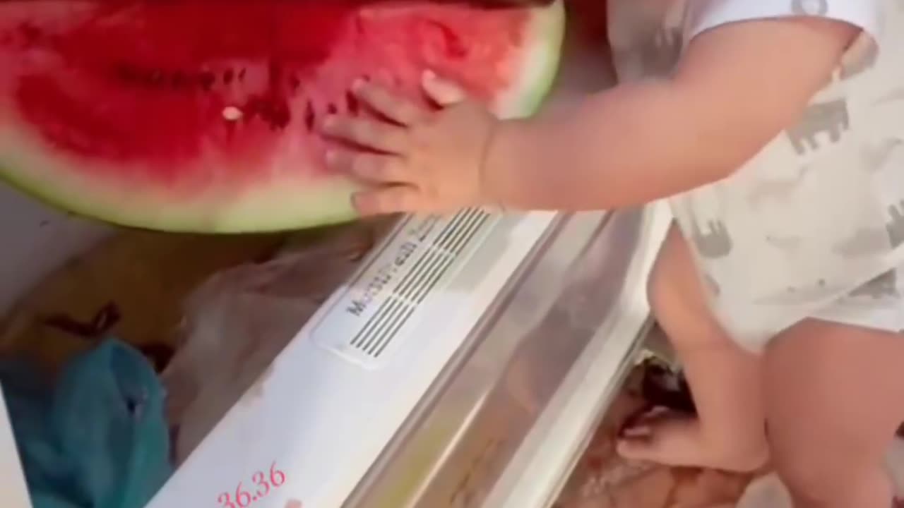 Cute baby enjoying watermelon🍉🍉🍉