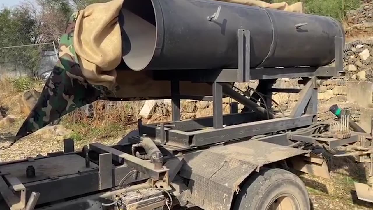 Attached is footage of a mobile rocket launcher located: