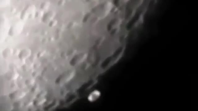 Object is filmed passing the Moon