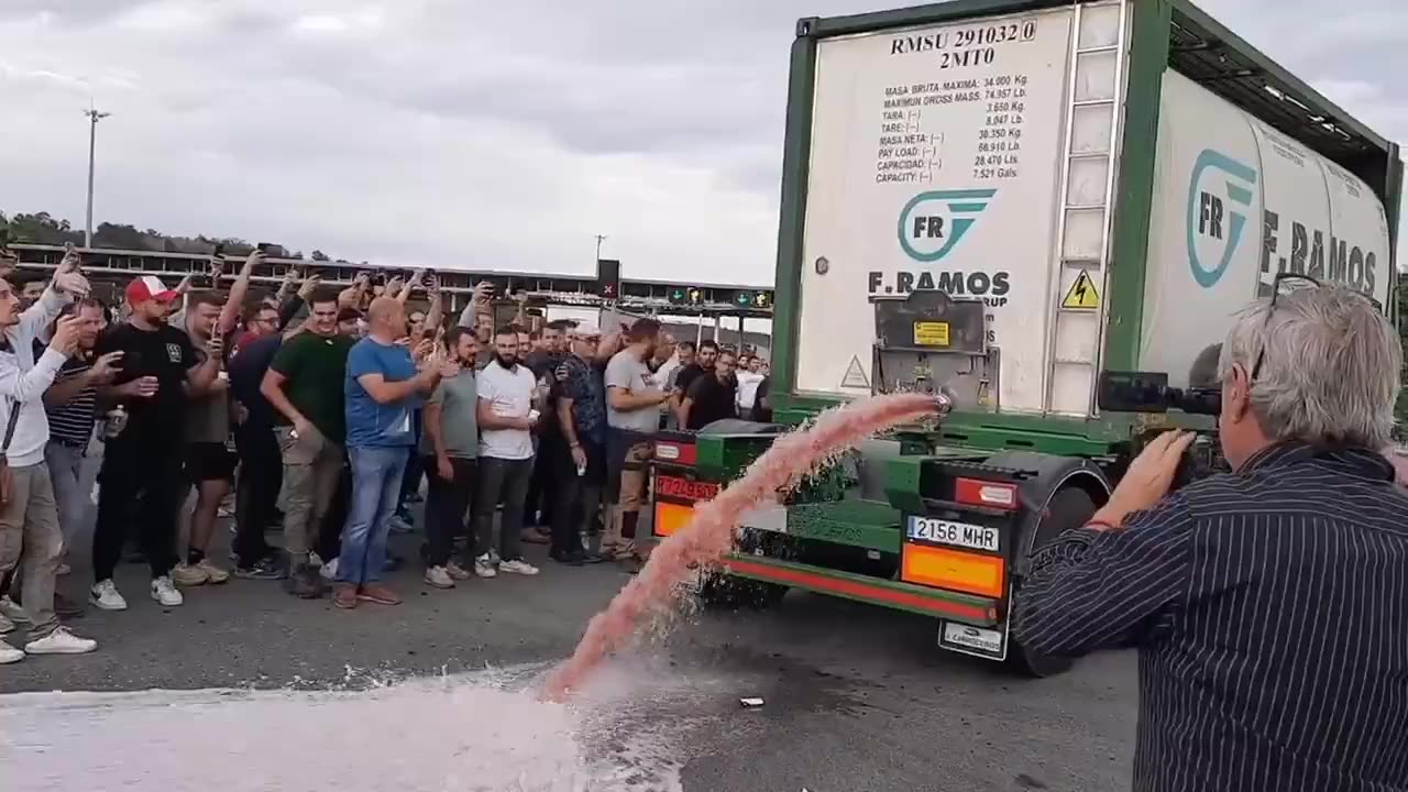 IN FRANCE ANGRY WINEMAKERS POURED OUT MORE THAN A THOUSAND LITERS OF WINE TO PROTEST CHEAP IMPORTS