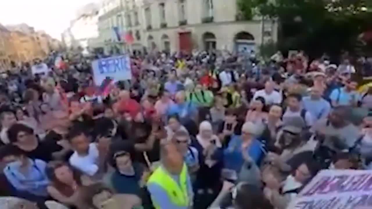 Angry nurse balances health situation in public during protest