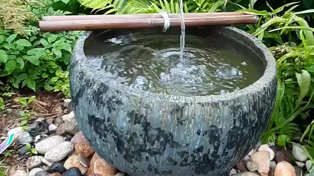 Beautiful mini waterwheel in the garden