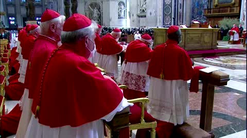 Pope Francis lies prostrate at Good Friday service