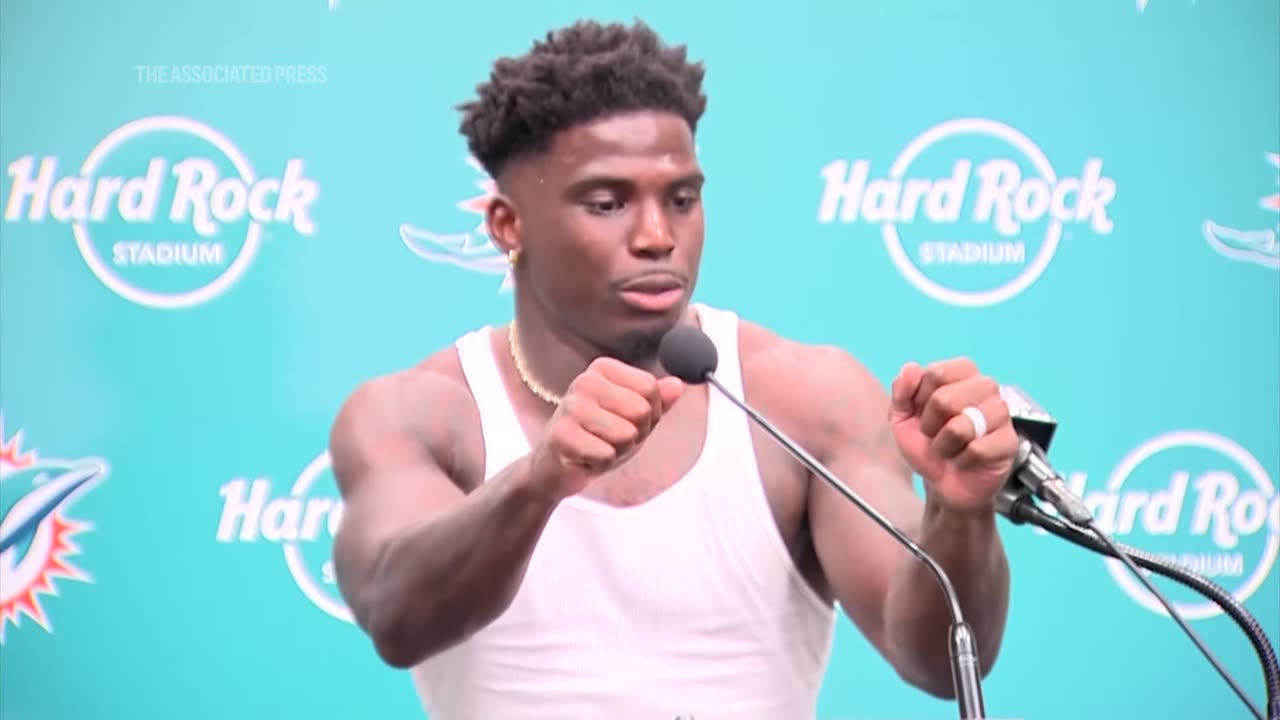 Tyreek Hill is detained by police before Dolphins game