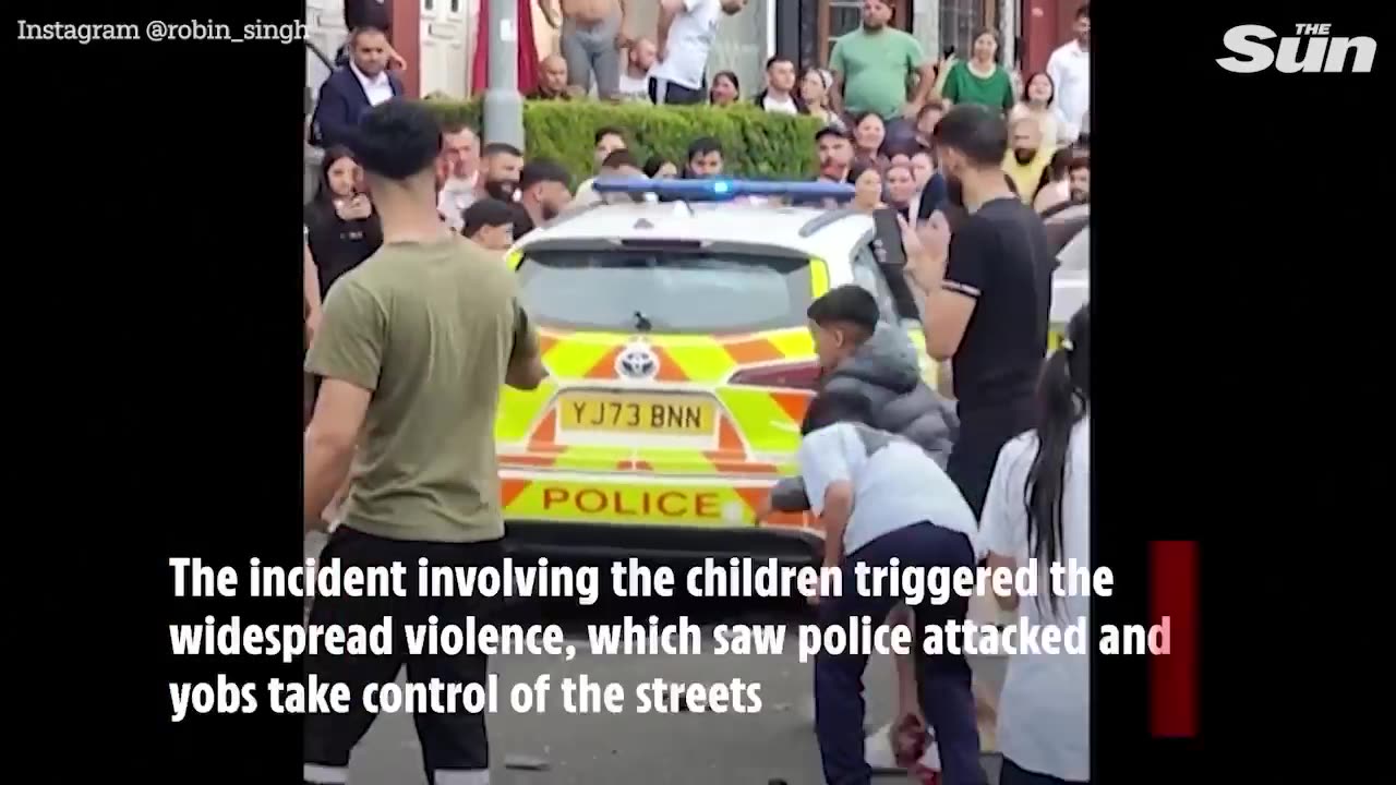 Footage captures first minutes of Leeds riots as cops surrounded by huge mob in Harehills