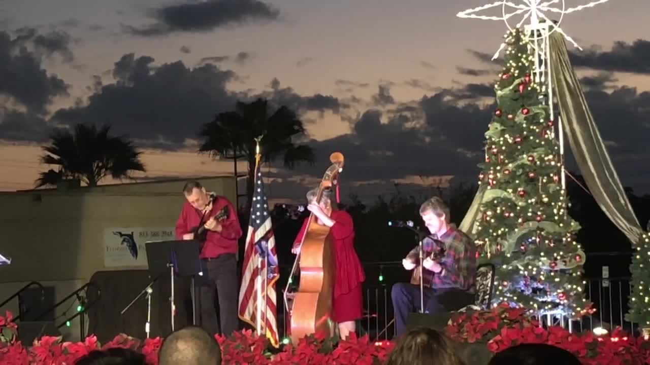 Dean Johnson, Lauren Harvey and Scott Rowell at 2018 tree lighting event at Advent Health
