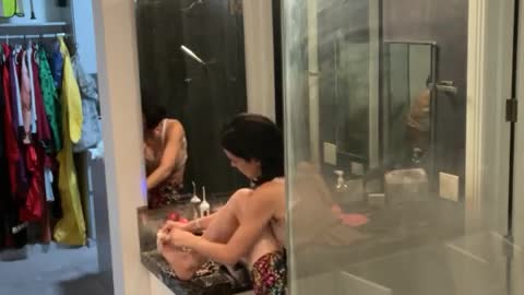 She’s about to notice a FRIEND in the SHOWER