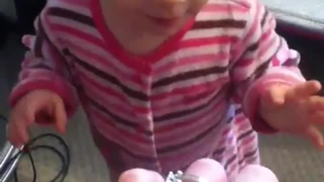 Emma plays with momma