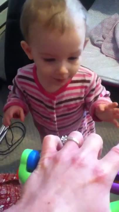 Emma plays with momma