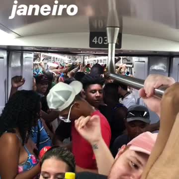 Rio de janeiro subway party, passengers sing and dance together
