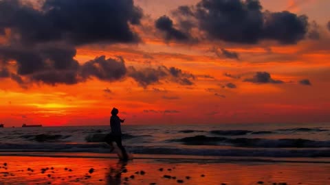 Boy running on the beach