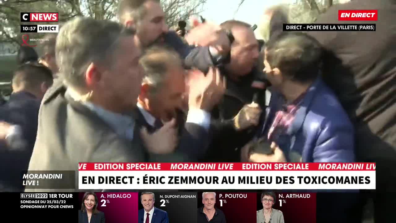 Protester throws water bottle at French presidential candidate Eric Zemmour